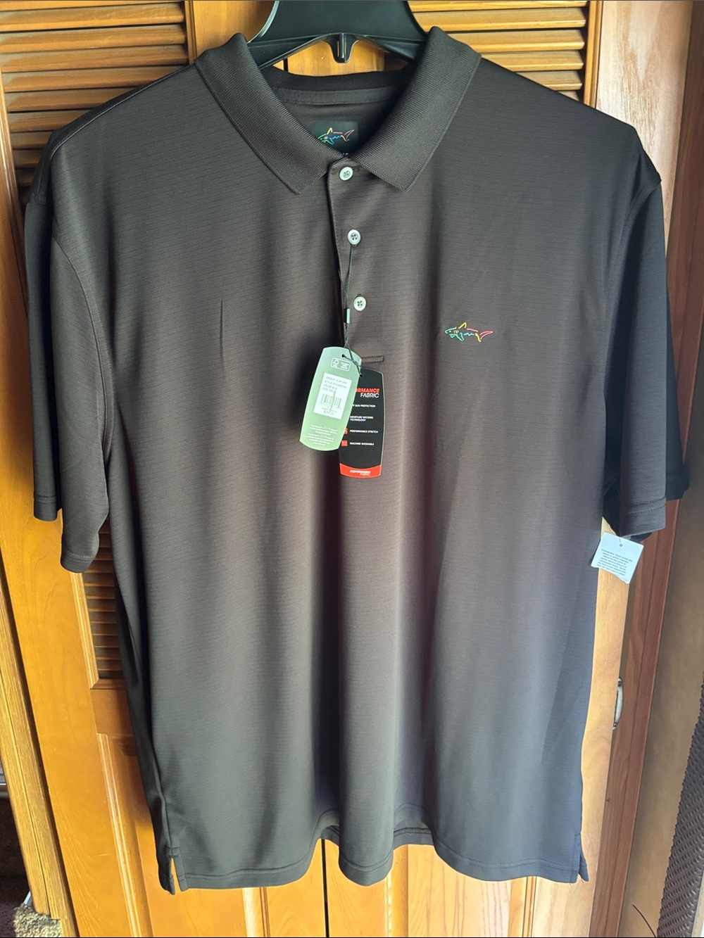 Greg Norman Men's Black Polo with Subtle Multicolor Shark xxl